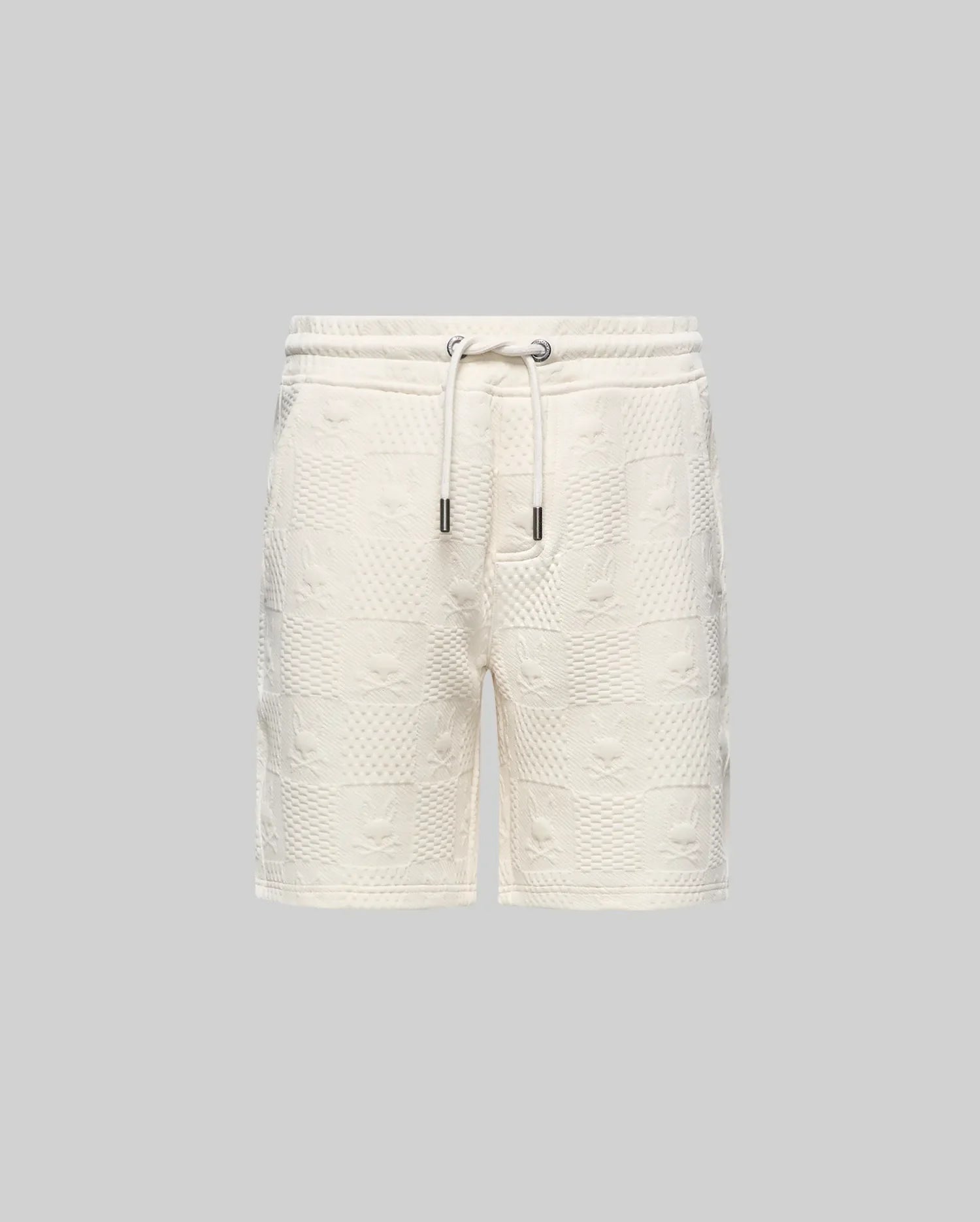 Kids Dustin Sweatshort, cream textured knit with a relaxed fit. Features an all-over embossed checkerboard pattern of Psycho Bunny skull logos and geometric squares.