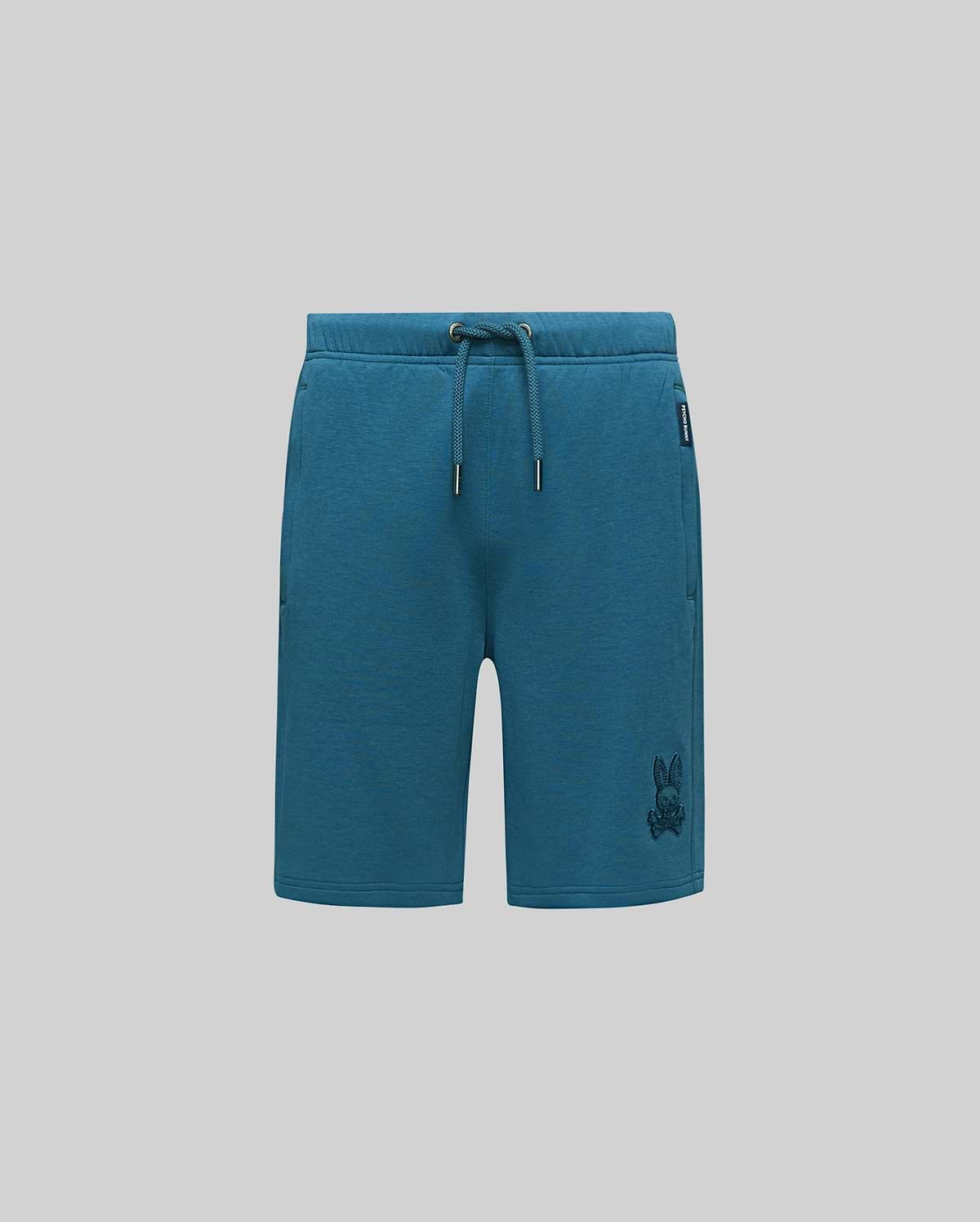 Kids Barry Modal Short, deep teal relaxed fit modal jersey shorts with drawstring waist, side pockets, a tonal embroidered Psycho Bunny skull logo on the right thigh, and a small brand tag.
