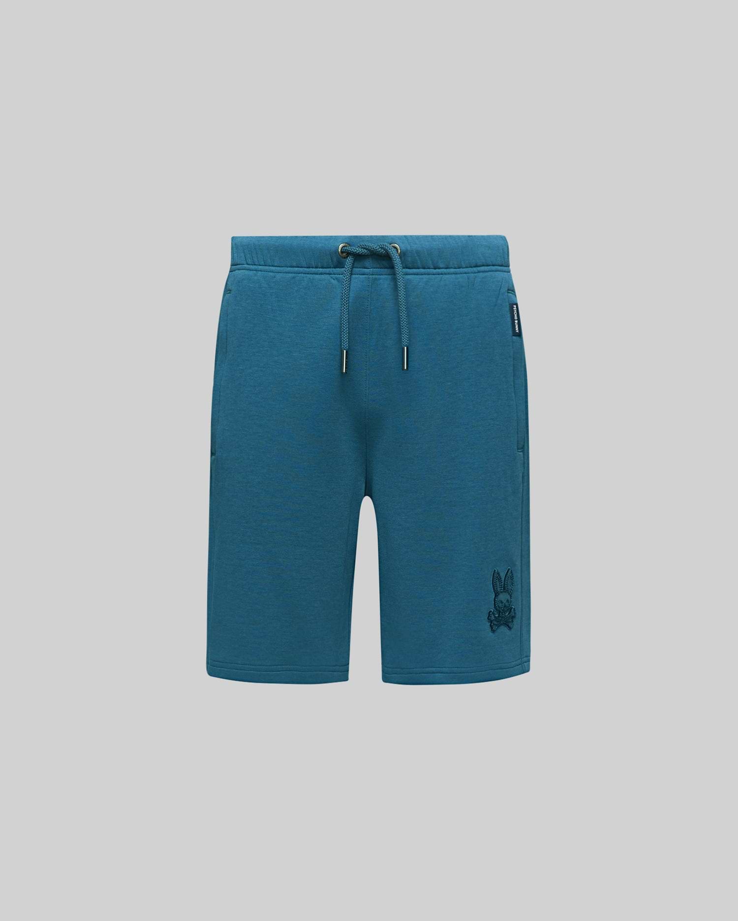 Kids Barry Modal Short, deep teal relaxed fit modal jersey shorts with drawstring waist, side pockets, a tonal embroidered Psycho Bunny skull logo on the right thigh, and a small brand tag.
