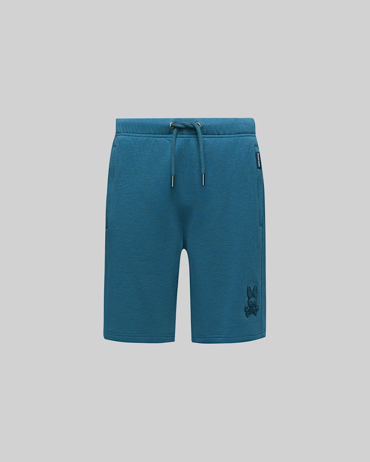 Kids Barry Modal Short, deep teal relaxed fit modal jersey shorts with drawstring waist, side pockets, a tonal embroidered Psycho Bunny skull logo on the right thigh, and a small brand tag.