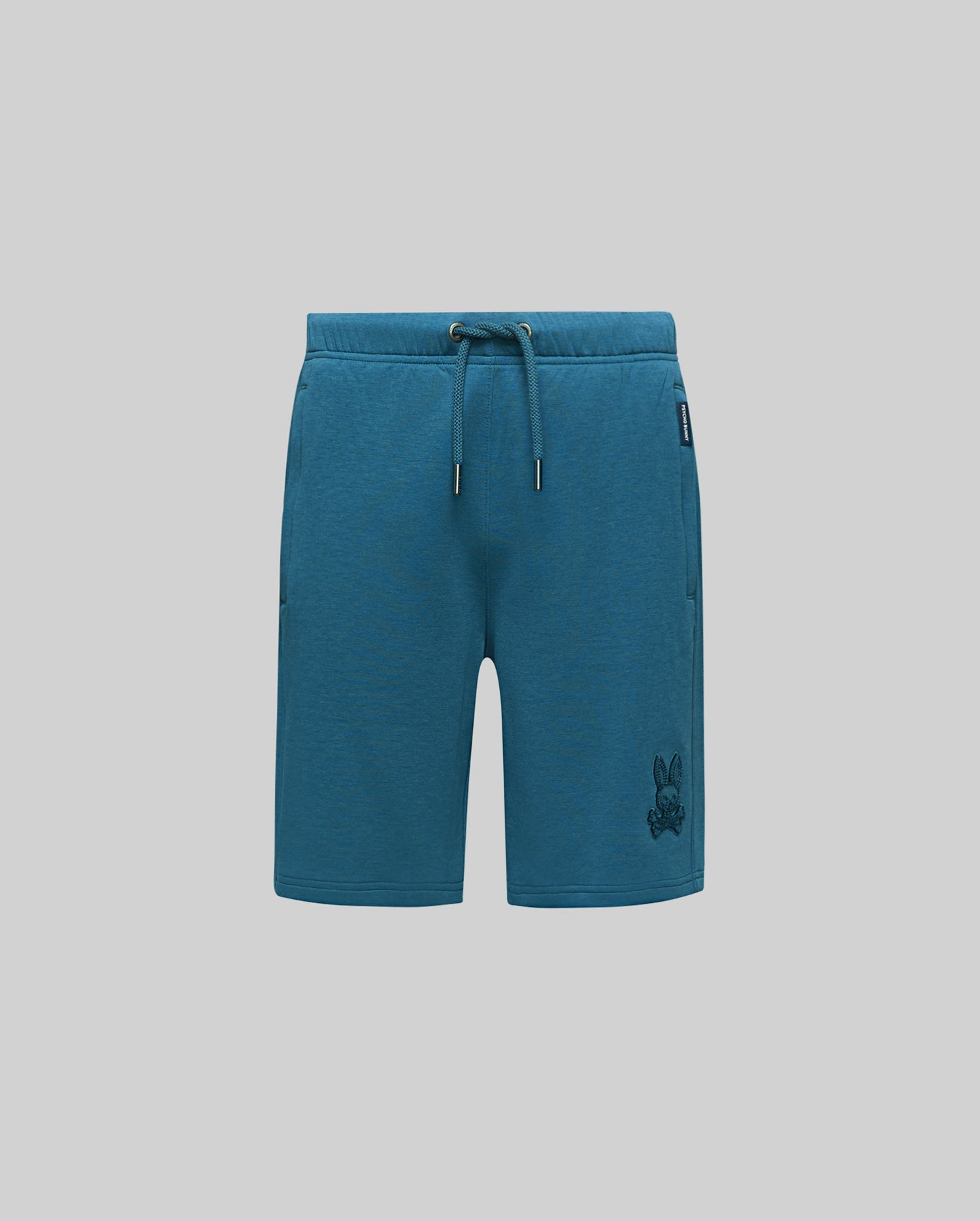 Kids Barry Modal Short, deep teal relaxed fit modal jersey shorts with drawstring waist, side pockets, a tonal embroidered Psycho Bunny skull logo on the right thigh, and a small brand tag.