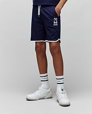 Kids Toby Short in navy jersey, featuring a relaxed fit, white drawstrings, white piping on the hem, and a prominent white embroidered Psycho Bunny skull logo on the left thigh.