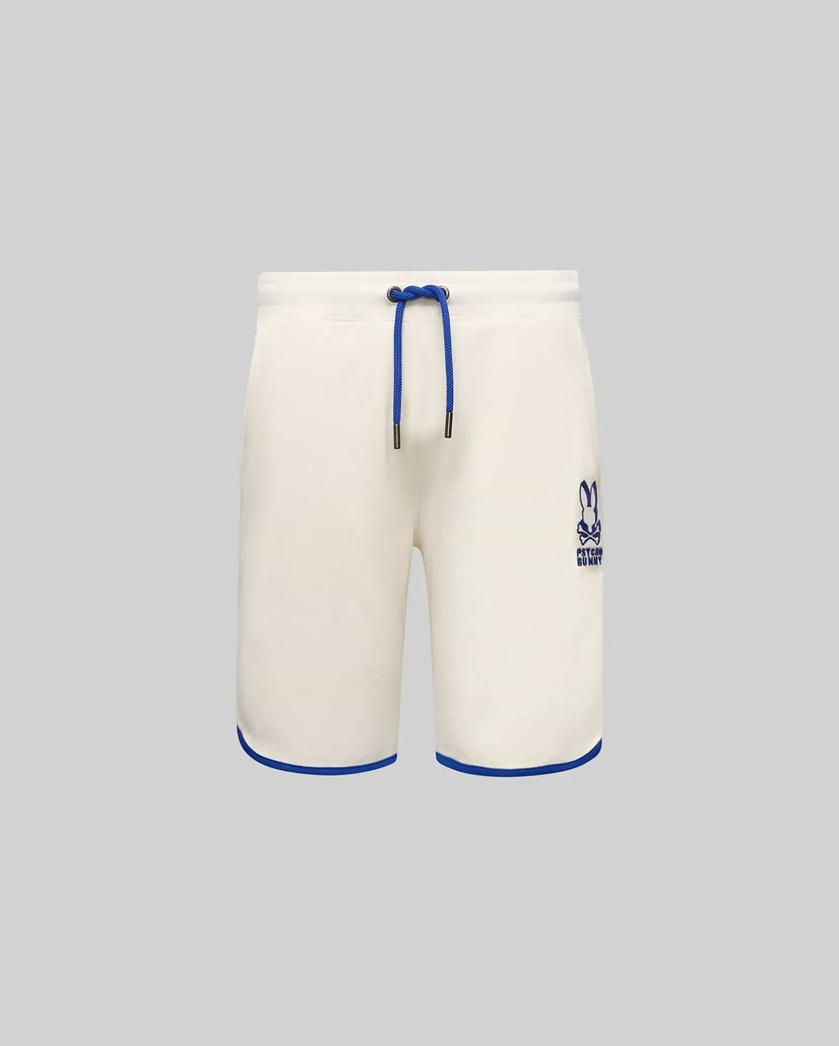 Kids Toby Short, cream relaxed fit French terry shorts with royal blue drawstring, embroidered Psycho Bunny skull logo on right thigh, and royal blue hem trim.