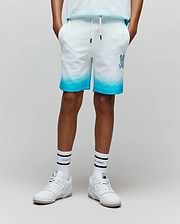 Kids Dax Sweatshort in white french terry, featuring a vibrant blue ombre fade from mid-thigh to hem, with an embroidered blue Psycho Bunny skull logo on the left thigh and a drawstring waist.