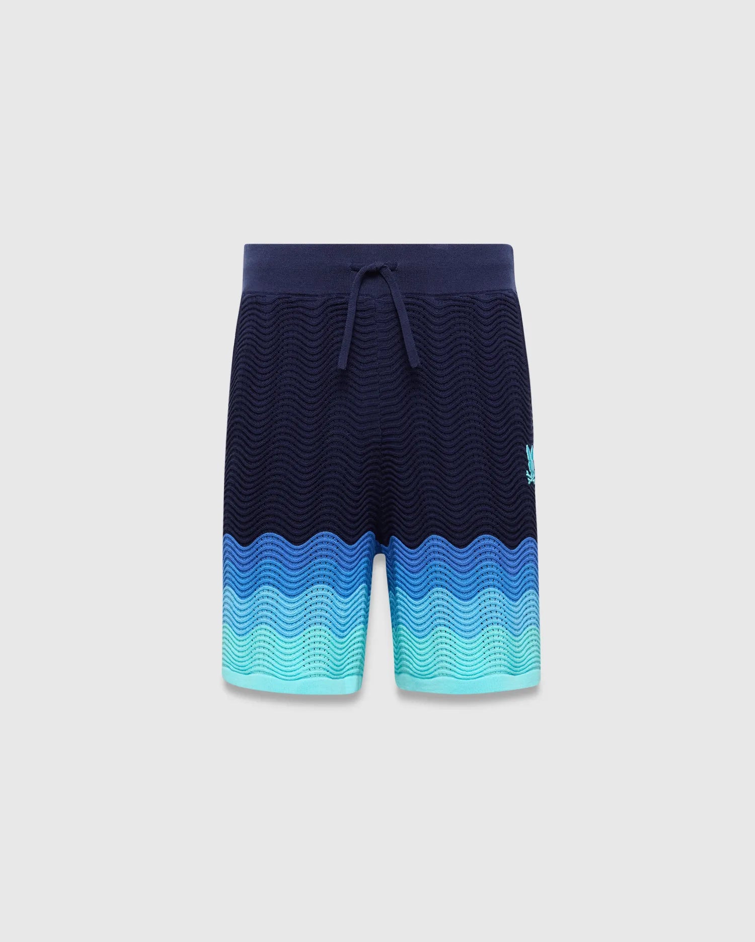 Kids Holden Knit Short in navy with a wavy knit texture, featuring a blue to teal gradient hem and a small embroidered Psycho Bunny skull logo on the left leg. Relaxed fit. (5)