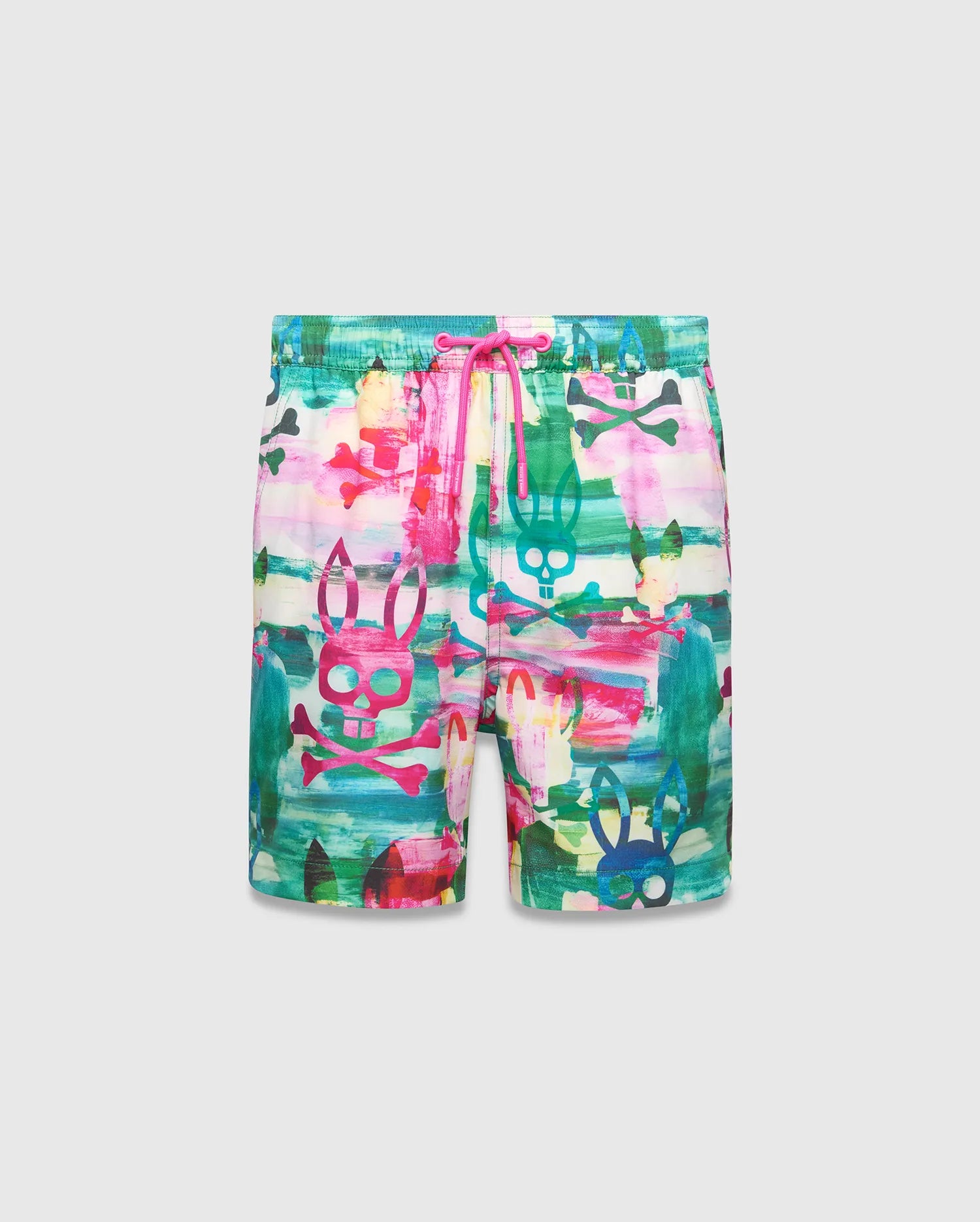 Kids Nate All Over Print Swim Trunk featuring a vibrant multi-color abstract brushstroke pattern with green, pink, blue, and yellow hues, an all-over Psycho Bunny skull and crossbones logo print, and a bright pink drawstring.