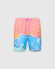 Kids Ray Swim Trunk 6, vibrant pink and orange sunburst top, blue waves with small Psycho Bunny skull logos in goggles and inner tubes, smooth fabric, relaxed fit.