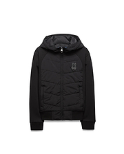 Kids Gordley Mix Media Jacket, a black hooded full-zip jacket with a quilted front panel, smooth sleeves, ribbed cuffs and hem, featuring a small embroidered Psycho Bunny skull logo on the left chest.