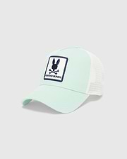 Kids Adamo Bunny Trucker Cap, a mint green cotton twill cap with a white mesh back. Features a prominent, embroidered navy blue and white Psycho Bunny skull logo patch on the front crown.