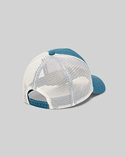 Kids Adamo Trucker Cap featuring a teal blue solid front and brim, with a breathable white mesh back and adjustable teal snapback closure. Psycho Bunny logo not visible from this angle.