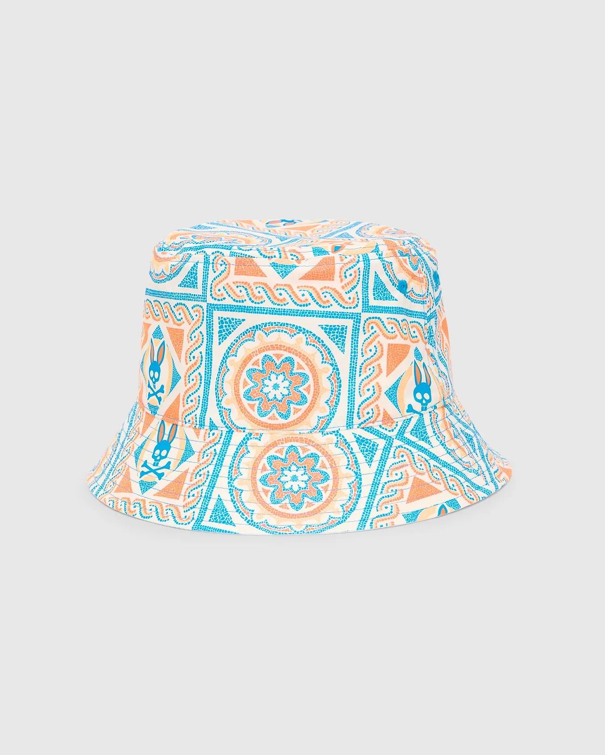 Kids Frank Reversible Bucket Hat featuring a vibrant cream, blue, and orange mosaic-style geometric and floral pattern with integrated Psycho Bunny skull logos.