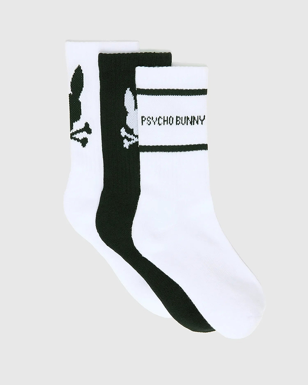 KIDS 3 PACK SPORT SOCKS in white and black, featuring large Psycho Bunny skull logos on two pairs and Psycho Bunny text with black stripes on one white pair, crafted from a smooth knit fabric.