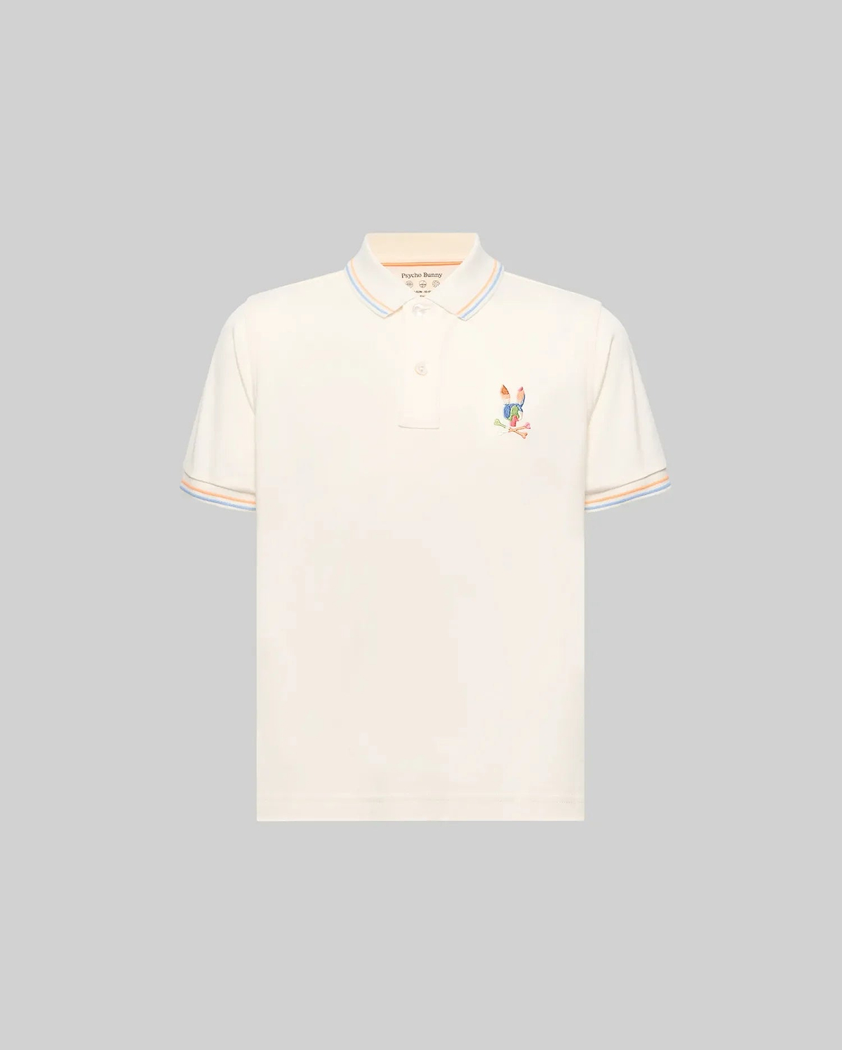 Kids Ara Pique Polo, cream classic fit pique polo with a small, multi-colored embroidered Psycho Bunny skull logo on the left chest and blue, orange, light blue striped collar and cuffs.