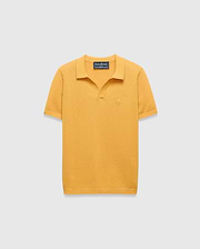 Kids Devon Knit Polo in mustard yellow, featuring a textured knit fabric, classic fit, and a small tonal embroidered Psycho Bunny skull logo on the left chest.