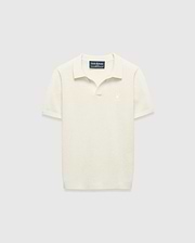 Kids Devon Knit Polo in cream, featuring a textured knit fabric, classic fit, and a small tonal embroidered Psycho Bunny skull logo on the left chest.