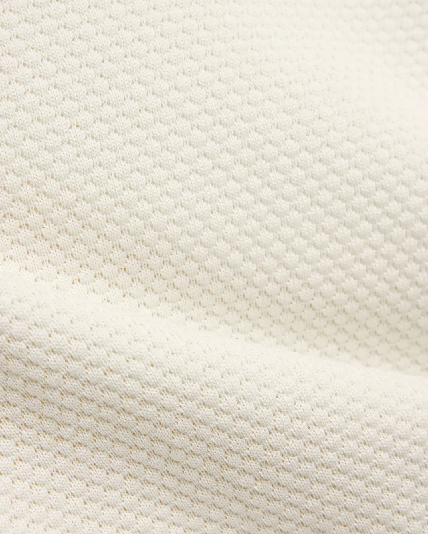Kids Devon Knit Polo in creamy off-white, featuring a refined textured knit fabric with a subtle, breathable pique-like pattern, perfect for premium streetwear.