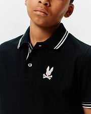 Kids Brad Pique Polo, black classic pique polo with white striped collar and sleeve cuffs, featuring an embroidered light grey Psycho Bunny skull logo on the left chest.