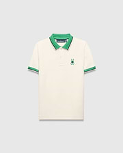 Kids Sunny Pique Polo in cream pique, classic fit, with a vibrant green collar, green and navy striped cuffs, and an embroidered green and blue Psycho Bunny skull logo on the left chest. (5)