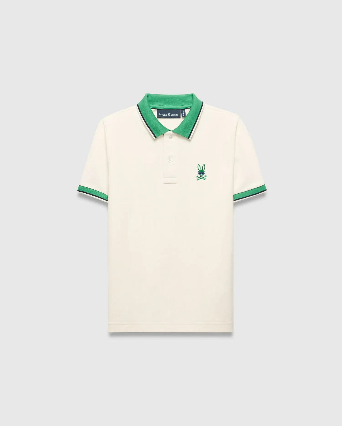 Kids Sunny Pique Polo in cream pique, classic fit, with a vibrant green collar, green and navy striped cuffs, and an embroidered green and blue Psycho Bunny skull logo on the left chest. (5)