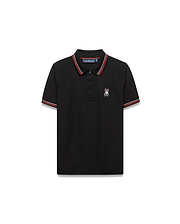 Kids Jaydon Pique Polo, black classic fit pique polo with red and white striped collar and cuffs, featuring a small embroidered Psycho Bunny skull logo on the left chest.