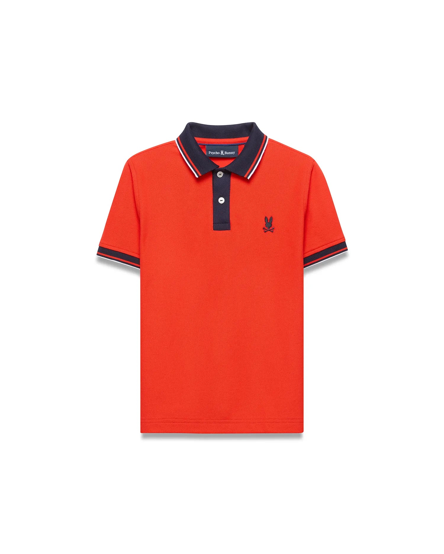 Kids Stan Pique Polo in vibrant orange-red pique knit, featuring a navy collar with white stripe, navy placket, and striped cuffs. Classic fit with small embroidered navy Psycho Bunny skull logo on left chest. (3)