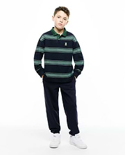 Kids Drew Striped L/S Pique Polo, navy with green stripes and dark green collar, featuring a small embroidered Psycho Bunny skull on chest, paired with navy relaxed sweatpants with subtle thigh logo.