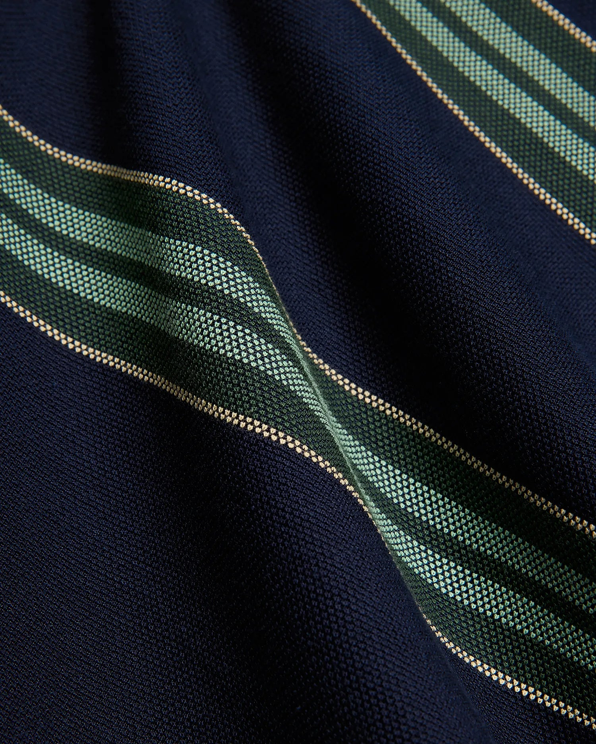 Kids Drew Striped L/S Pique Polo in navy, featuring a textured pique knit fabric with bold horizontal stripes in dark green, mint green, and thin beige accents.