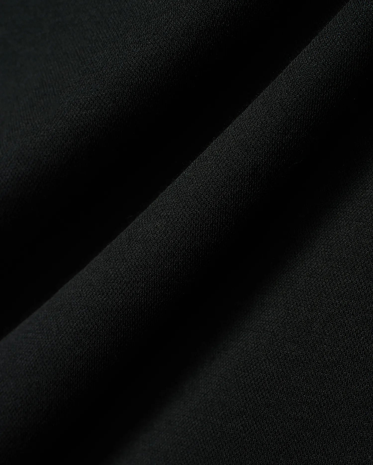 Kids Timmy Pique Polo in classic black, featuring a premium, finely textured pique knit fabric with soft, flowing folds, embodying Psycho Bunny's signature style. (6)