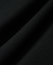 Kids Timmy Pique Polo in classic black, featuring a premium, finely textured pique knit fabric with soft, flowing folds, embodying Psycho Bunny's signature style. (6)