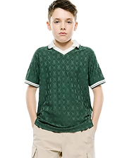 Kids Garry Jacquard Johnny Collar Polo, a classic fit dark green jacquard knit polo with an all-over Psycho Bunny skull logo pattern, white V-neck collar, and striped cuffs.