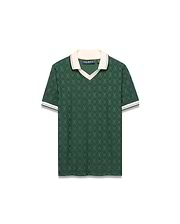 Deep green jacquard knit Kids Garry Jacquard Johnny Collar Polo with an all-over Psycho Bunny skull pattern, a cream V-neck collar, and striped ribbed cuffs. Small embroidered logo on chest.