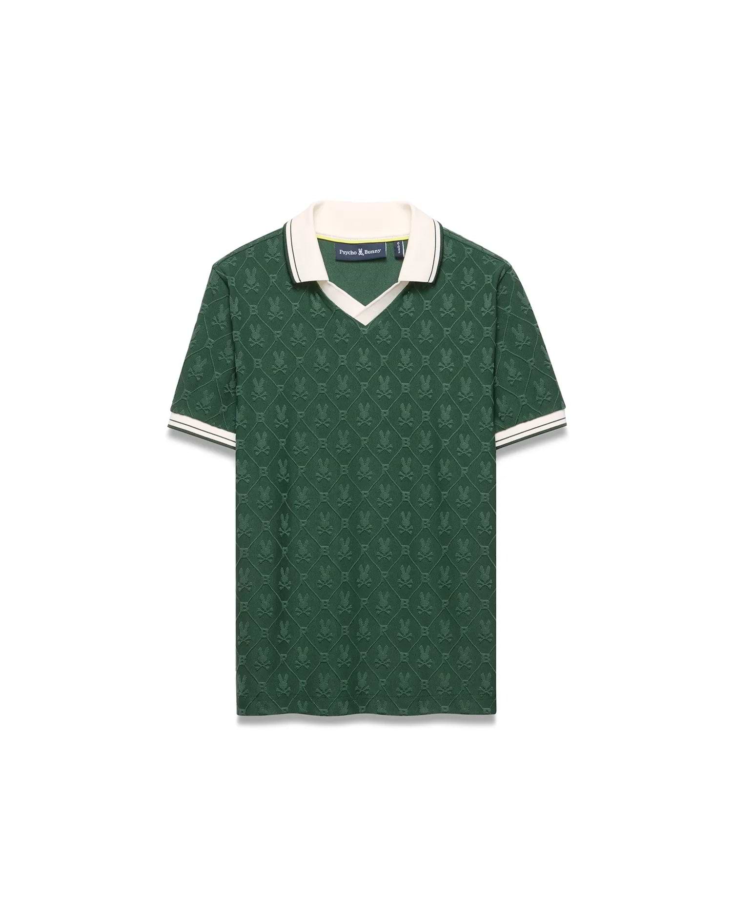 Deep green jacquard knit Kids Garry Jacquard Johnny Collar Polo with an all-over Psycho Bunny skull pattern, a cream V-neck collar, and striped ribbed cuffs. Small embroidered logo on chest.