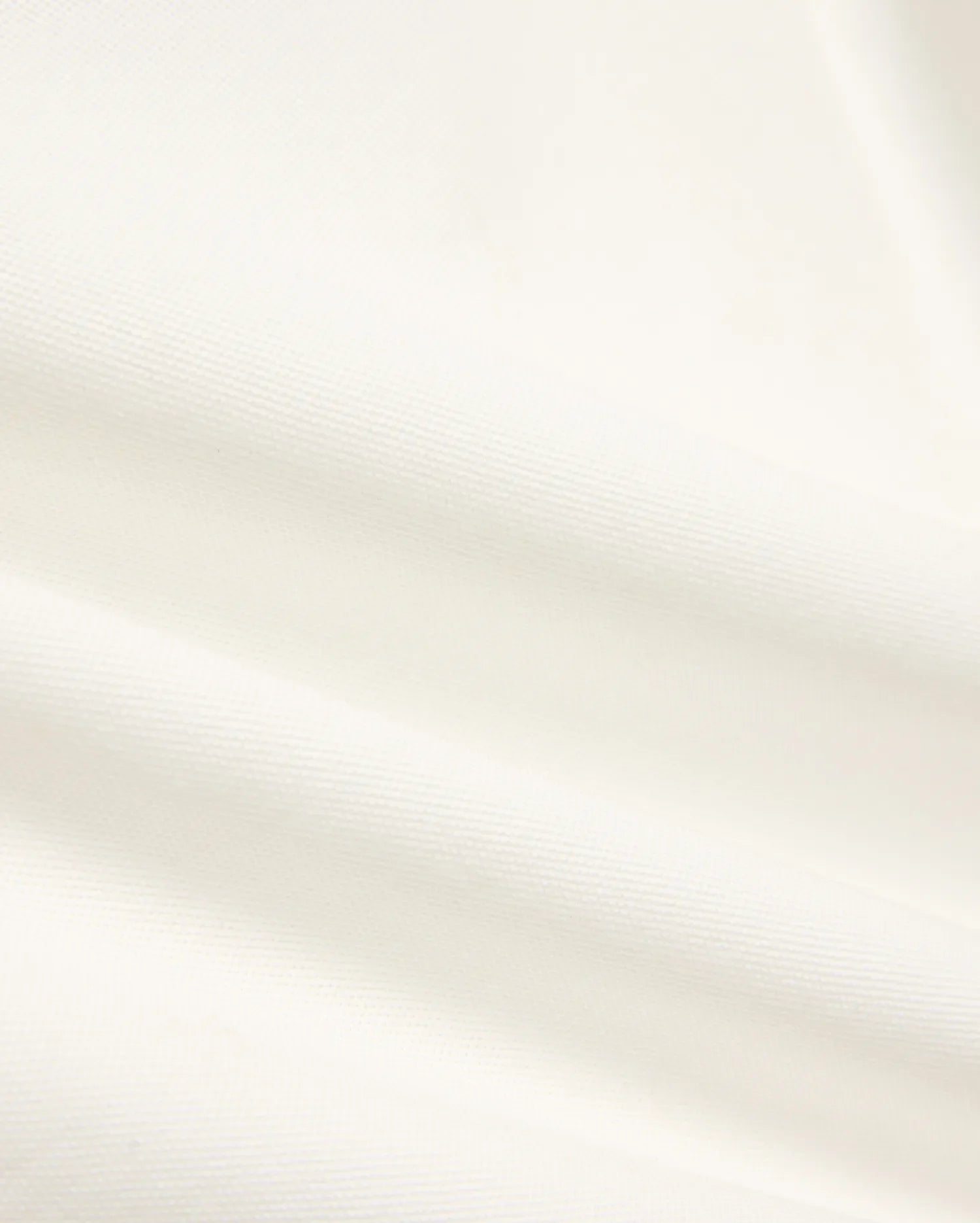 Kids' Klaus Pique Polo, a premium off-white polo featuring the distinctive textured pique fabric with elegant folds, reflecting Psycho Bunny's refined streetwear. (6)