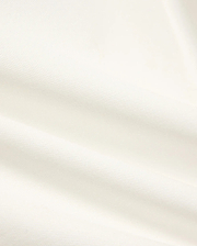 Kids' Klaus Pique Polo, a premium off-white polo featuring the distinctive textured pique fabric with elegant folds, reflecting Psycho Bunny's refined streetwear. (6)