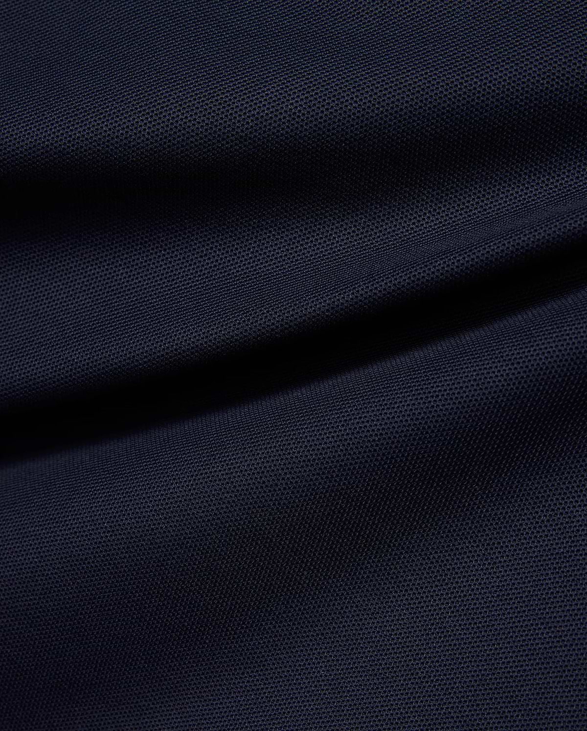 Kids' Grover Pique Longsleeve Polo in deep navy blue, showcasing the classic textured pique knit fabric with subtle draping, ideal for comfortable, stylish wear. (6)