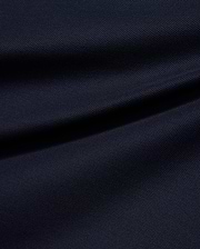 Kids' Grover Pique Longsleeve Polo in deep navy blue, showcasing the classic textured pique knit fabric with subtle draping, ideal for comfortable, stylish wear. (6)