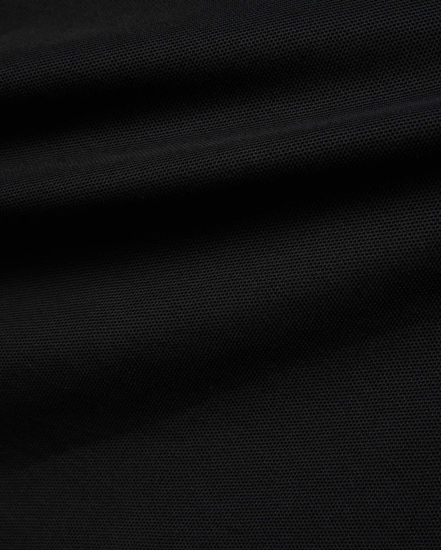 Black Kids Robin Pique Polo, a classic fit crafted from premium textured pique fabric, featuring the iconic embroidered Psycho Bunny skull logo on the left chest.