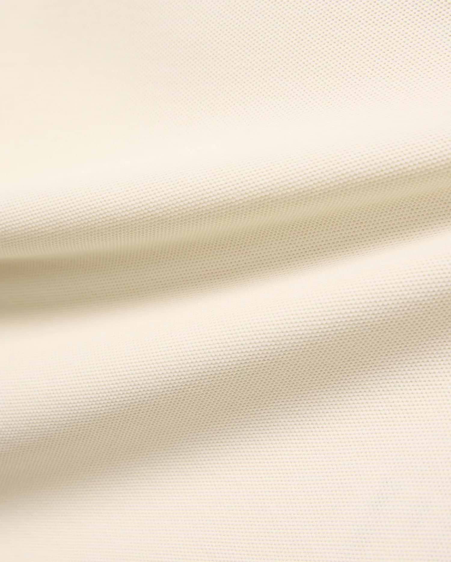 Kids Robin Pique Polo, a premium light cream polo shirt crafted from soft, breathable pique fabric, showcasing its refined, textured weave for comfort and style, perfect for everyday wear.