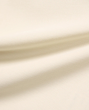 Kids Robin Pique Polo, a premium light cream polo shirt crafted from soft, breathable pique fabric, showcasing its refined, textured weave for comfort and style, perfect for everyday wear.