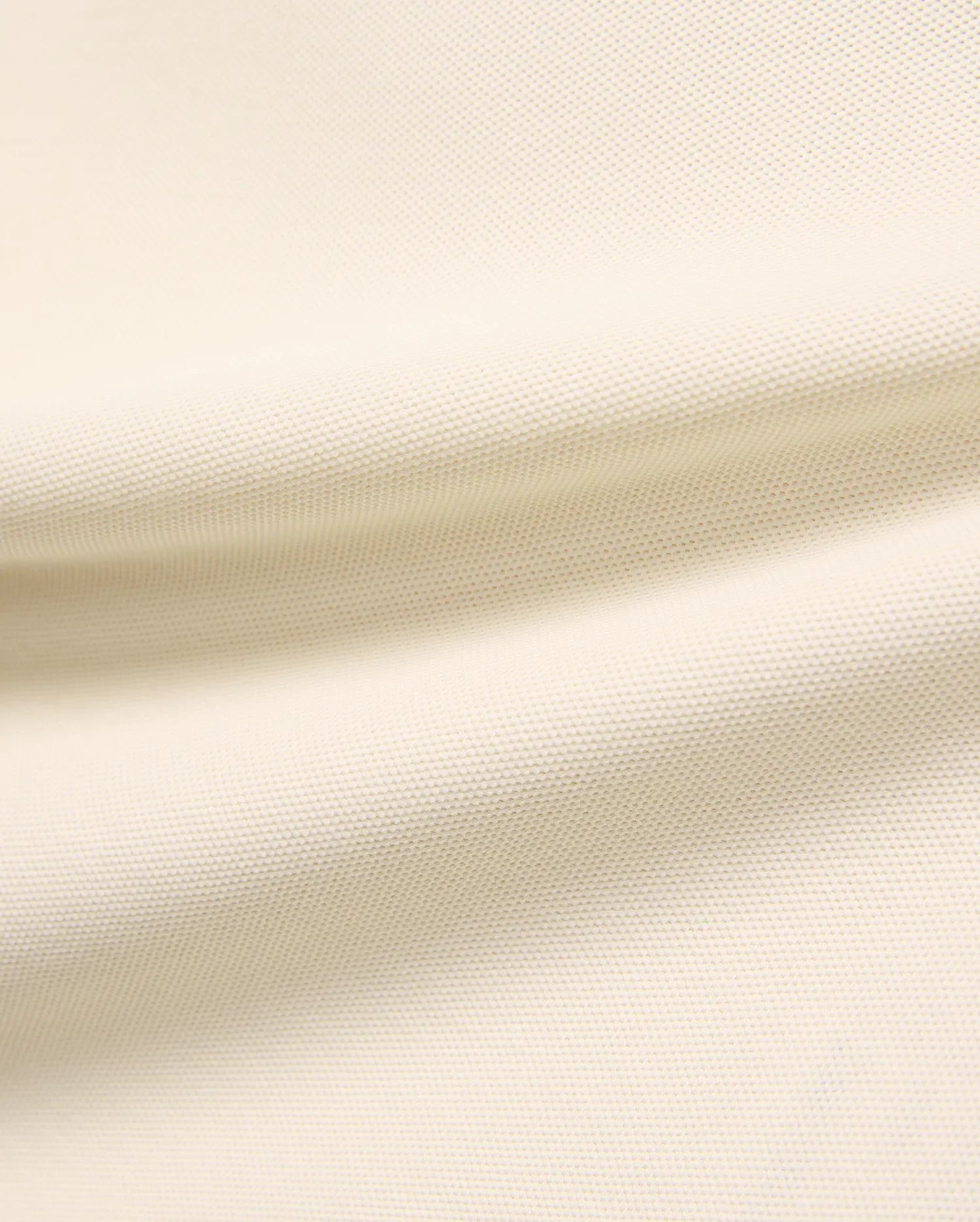 Kids Robin Pique Polo, a premium light cream polo shirt crafted from soft, breathable pique fabric, showcasing its refined, textured weave for comfort and style, perfect for everyday wear.