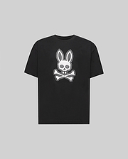 The Psycho Bunny KIDS RYDER OVERSIZED FIT TEE (KT0200056) is a black premium tee crafted from soft Pima cotton, featuring a white embroidered Bunny skull with bunny ears above crossed bones against a gray background.