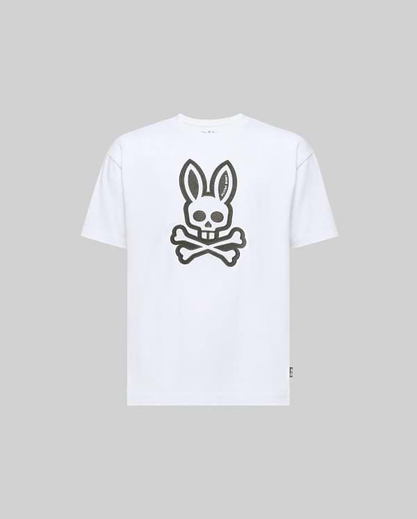 The KIDS RYDER OVERSIZED FIT TEE (KT0200056) by Psycho Bunny features a large stylized rabbit skull and crossbones graphic on the front, set against a light gray Pima cotton for premium softness.
