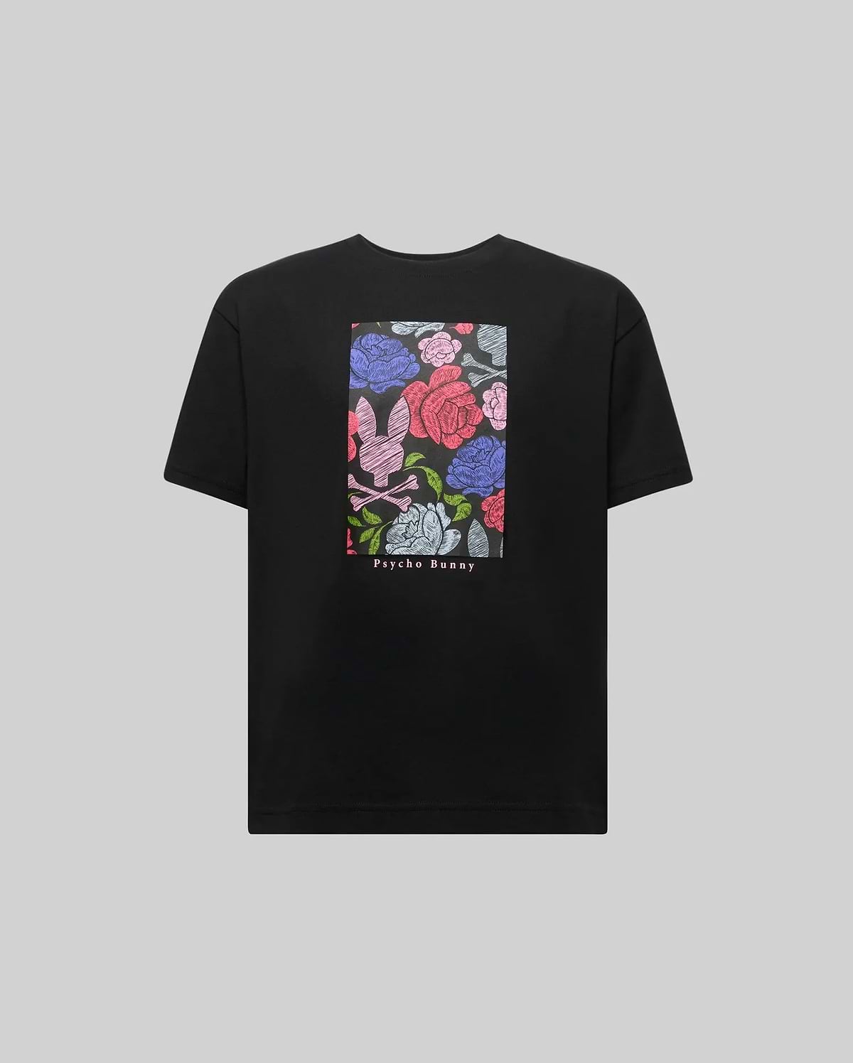 The KIDS ROWEN OVERSIZED TEE (KT0200093) by Psycho Bunny is a black Pima cotton shirt featuring a vibrant floral graphic with pink, blue, and red details, plus "Psycho Bunny" printed beneath the design on the front. (5)
