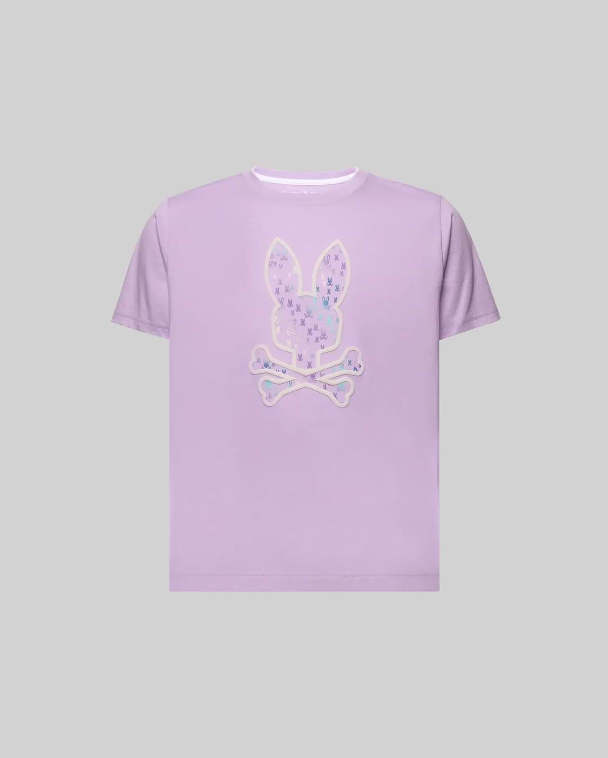 Kids Nev Bunny Graphic Tee in lavender, a classic fit, smooth jersey knit shirt featuring a large central Psycho Bunny skull logo graphic with a white outline, filled with a vibrant, multi-color pattern of smaller bunny skulls. (1)