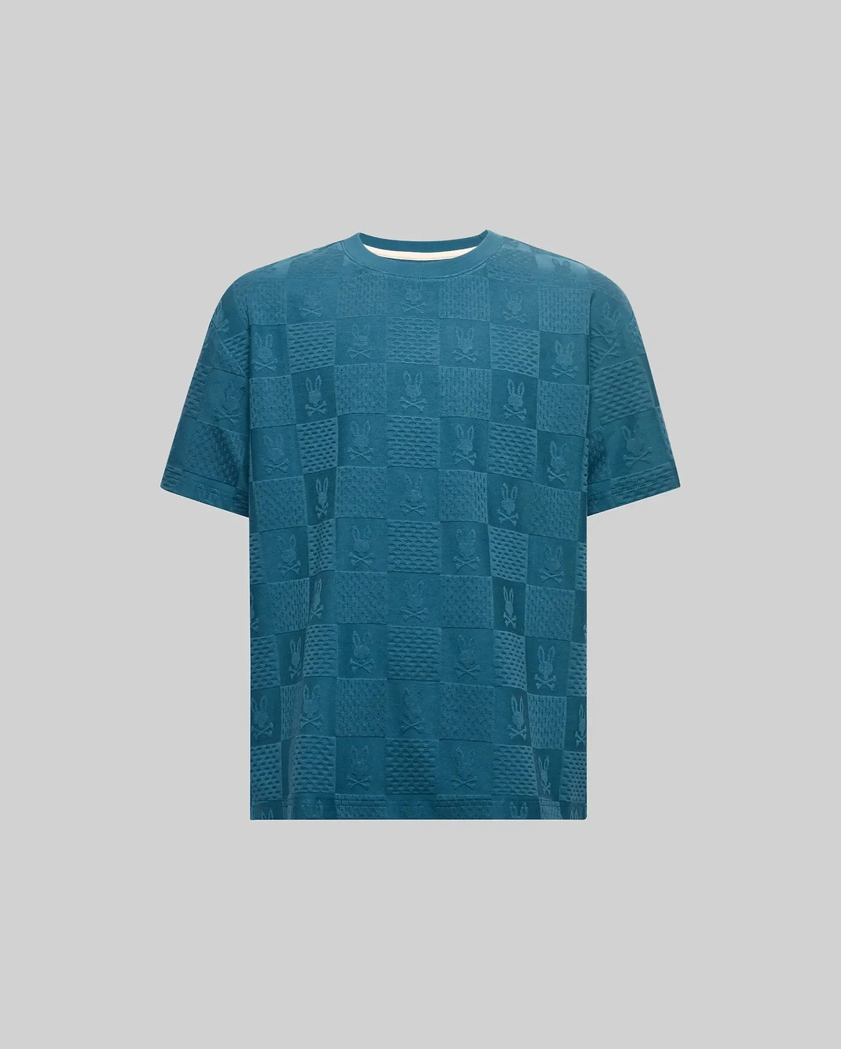Kids Dustin Oversized Tee in teal blue, a relaxed fit textured knit featuring an all-over checkerboard pattern with embossed Psycho Bunny skull logos.