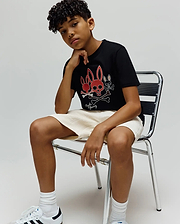 Kids Oscar Graphic Tee, black jersey knit, classic fit. Features a bold central graphic with two red bunny skulls, a white bunny skull, crossed bones, and Psycho Bunny text. (4)