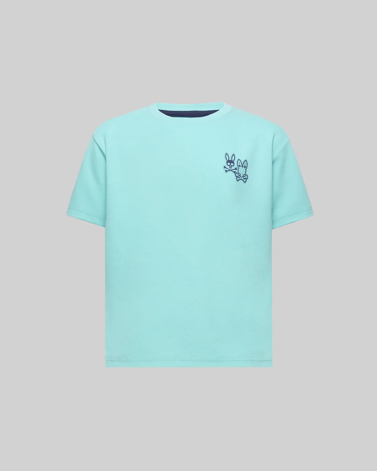 Kids Luke Back Graphic Tee, an aqua classic fit jersey with a navy crew neck trim and a small navy Psycho Bunny skull and crossbones graphic alongside another bunny on the left chest.