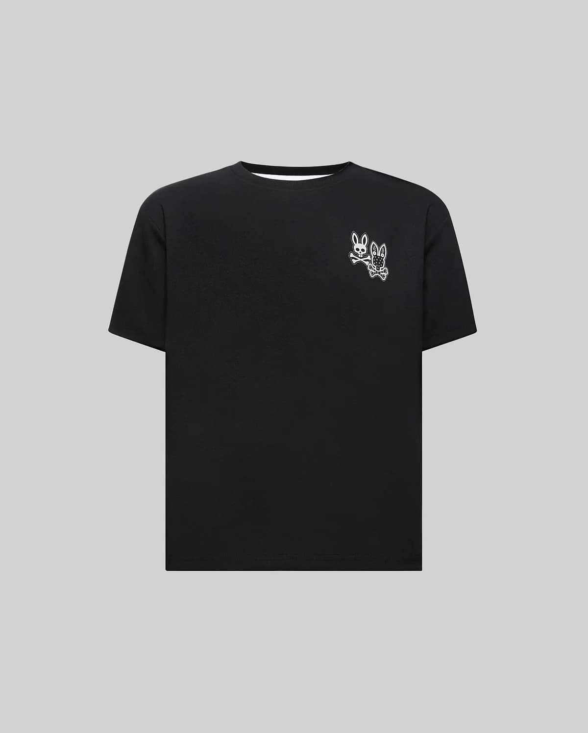 Kids Luke Back Graphic Tee, a black jersey t-shirt with a classic fit, featuring a small white double Psycho Bunny skull and crossbones graphic on the upper left chest.