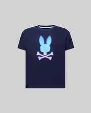 Kids Caspian Graphic Tee, navy blue classic fit jersey t-shirt featuring a large gradient blue to pink Psycho Bunny skull and crossbones graphic on the center chest, with a light blue inner collar trim.