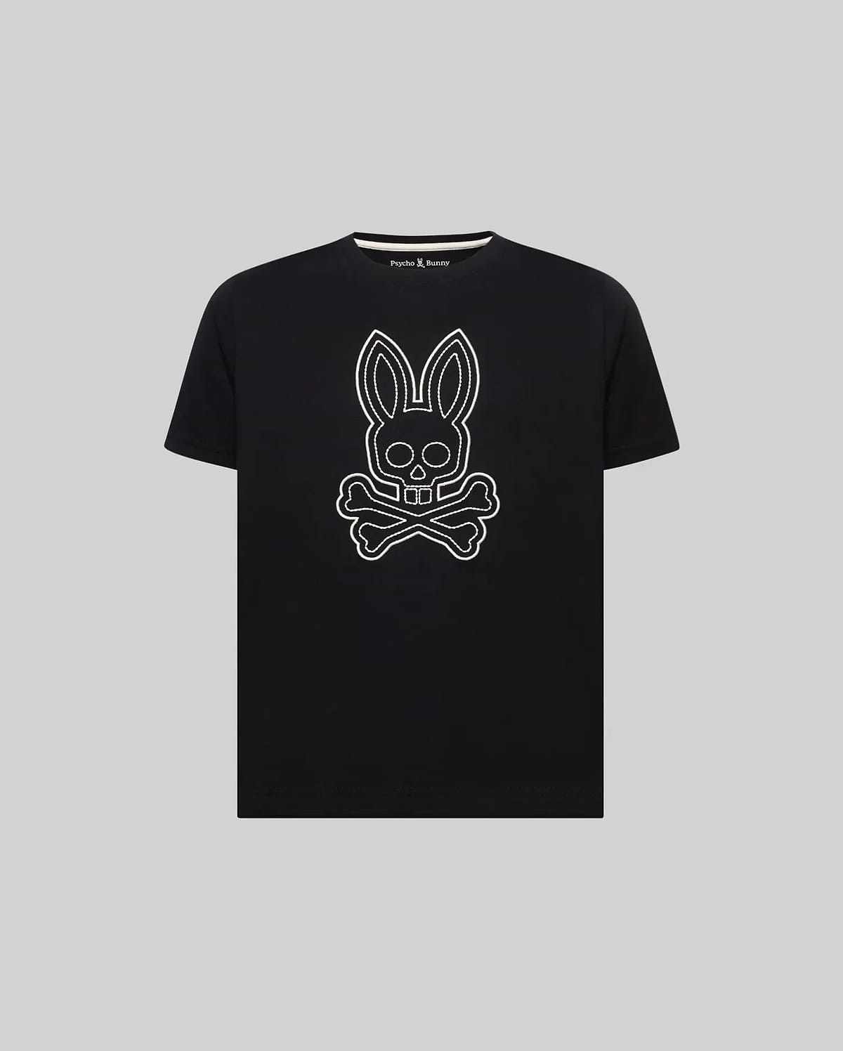 Kids Marcel Graphic Tee, black classic fit jersey tee with a large white outline bunny skull graphic on the chest and a small Psycho Bunny logo on the inner neck.